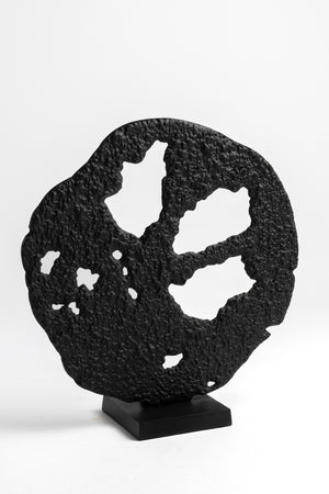 Escultura abstracta de forma circular
